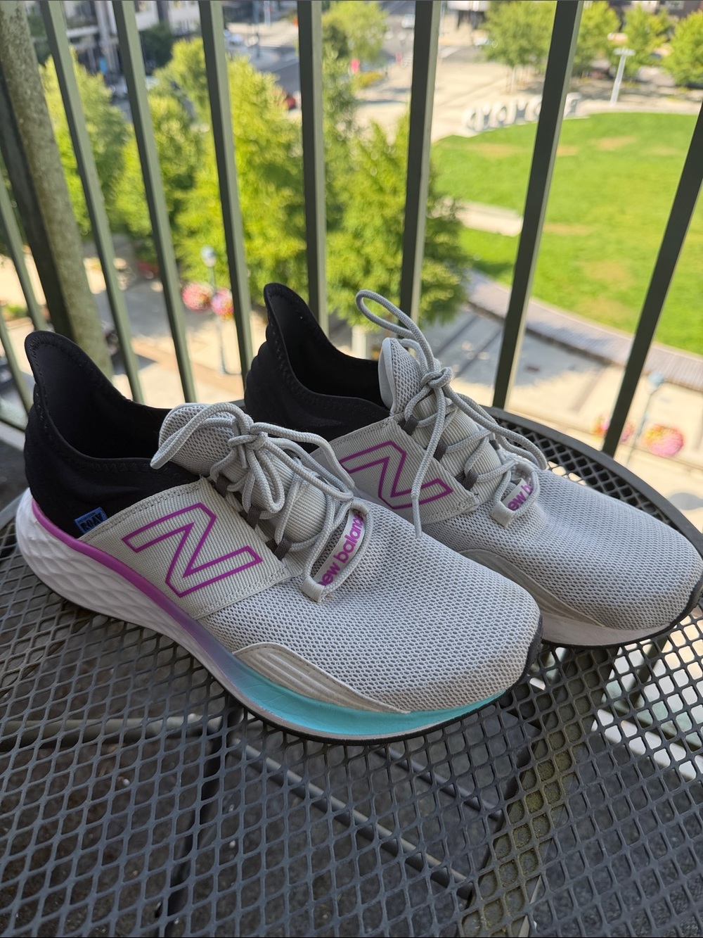 New Balance Women’s Fresh Foam Roav Light Gray Mesh Sneakers with pink trim